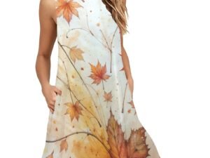 Flattering A-line style loose sleeveless mid-length dress with pockets and a round neckline in a soft stretchy fabric. This stylish and comfortable dress has an all-over print in a mix of orange, yellow, pink, brown stems and autumn or fall leaves gently falling against a white background.