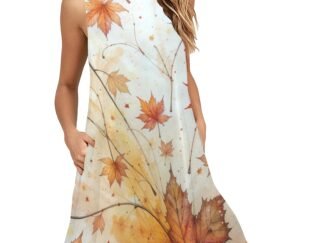 Flattering A-line style loose sleeveless mid-length dress with pockets and a round neckline in a soft stretchy fabric. This stylish and comfortable dress has an all-over print in a mix of orange, yellow, pink, brown stems and autumn or fall leaves gently falling against a white background.