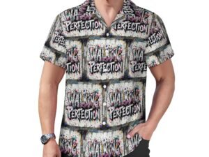 "Walking Perfection" all-over printed Men`s Cuban Collar Shirt in gray background with white letters with bold black outlines and pink and dark gray shading in a graffiti style