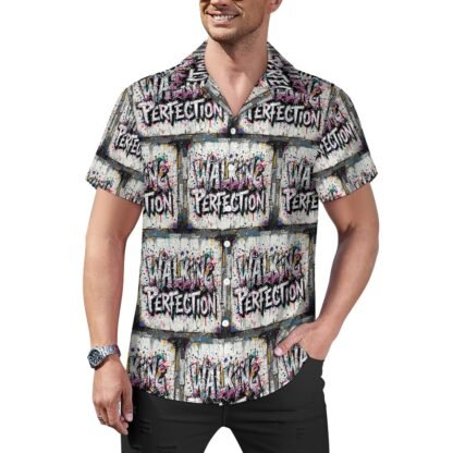 "Walking Perfection" all-over printed Men`s Cuban Collar Shirt in gray background with white letters with bold black outlines and pink and dark gray shading in a graffiti style