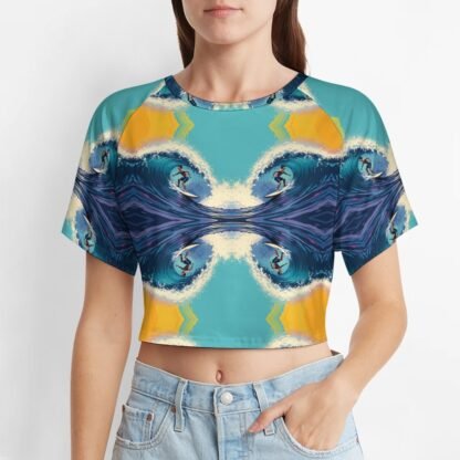"Surfer" 1 Women`s Short T-Shirt with an all-over print of a double-flipped image of a surfer with aqua and yellow background, with the surfer going left and right both right way up and upside down