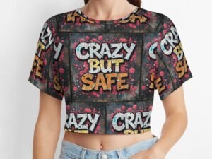 "Crazy But Safe" 2 Women's Short T-Shirt with an all-over print in graffiti style in dark gray background with yellow and white letters with bold black outlines and pink shadows