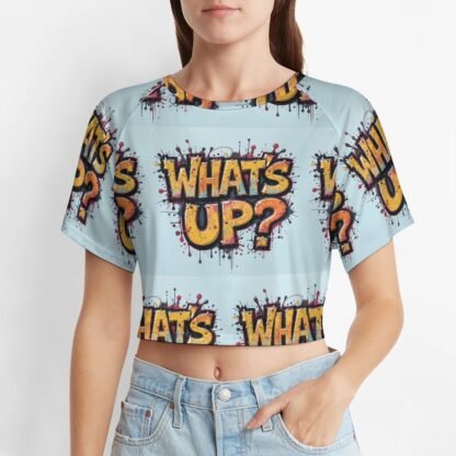 "What`s Up?"2 Women`s Short T-Shirt with all-over print in graffiti style in pale blue background with yellow/orange letters with bold black outlines