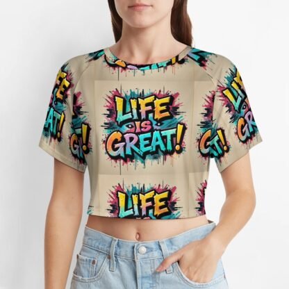 "Life Is Great!" 2 Women`s Short T-Shirt with an all-over print in graffiti style in pale brown background with yellow, pink and blue letters with bold black outlines