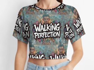 "Walking Perfection" 2 Women`s Short T-Shirt with an all-over print in graffiti style in blueish gray background with white letters with bold black outlines and a person standing behind the text